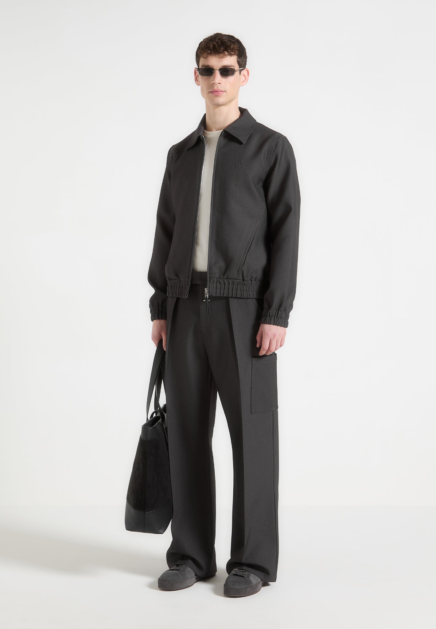 Weite Bundfaltenhose mit Taschen - Grau