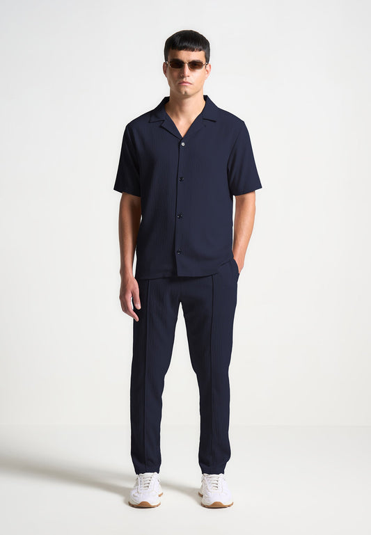Karottenhose aus Seersucker - Marineblau